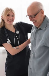 nurse-helping-old-man-walk 16.23.25