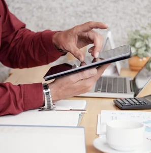 businessman-working-with-touchpad 1