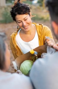 close-up-people-with-food-donations (1)